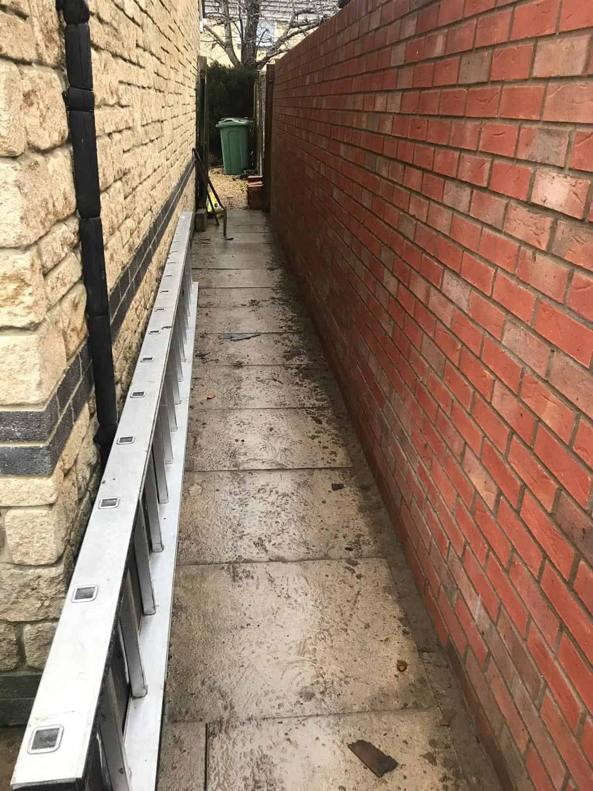 Brickwork & garden walls Gloucester Brick boundary wall with pier and cap stones in a Gloucester garden