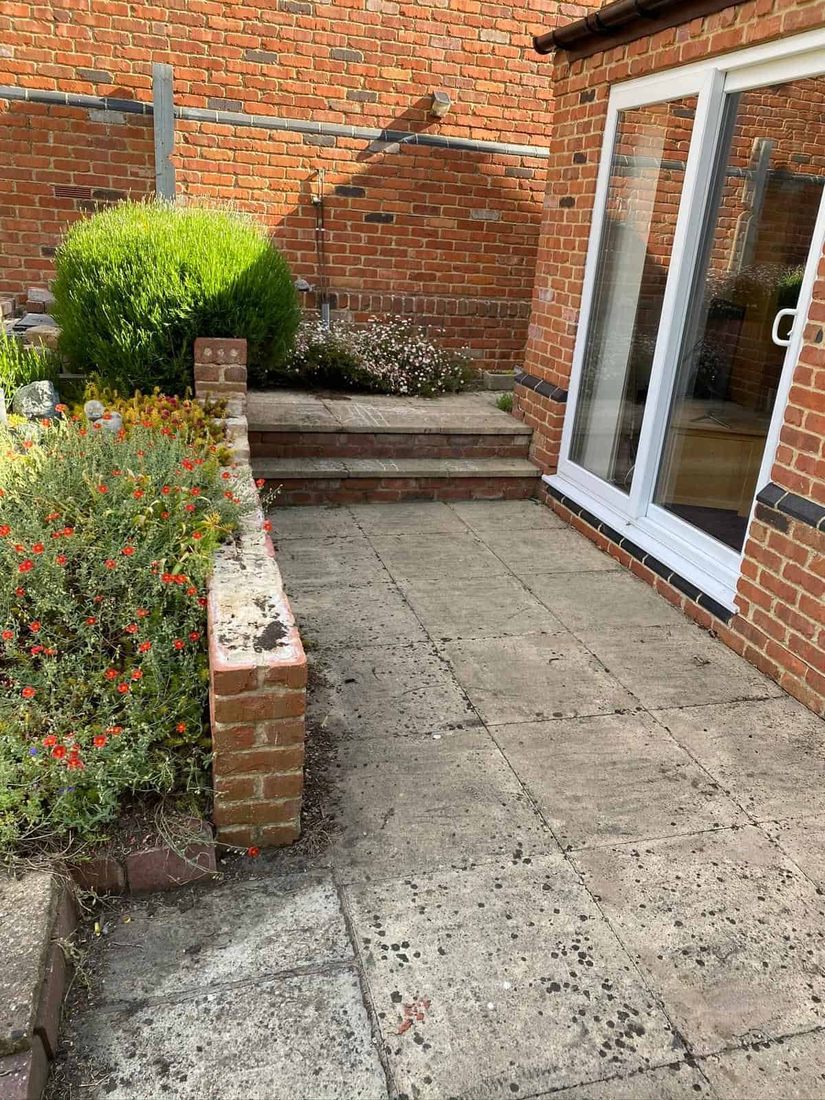 patios Gloucester Before - Garden before patio installation — overgrown lawn in Gloucestershire