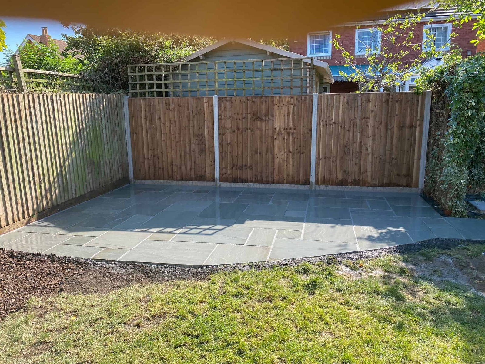 Post-and-rail fencing along a garden boundary in Gloucester