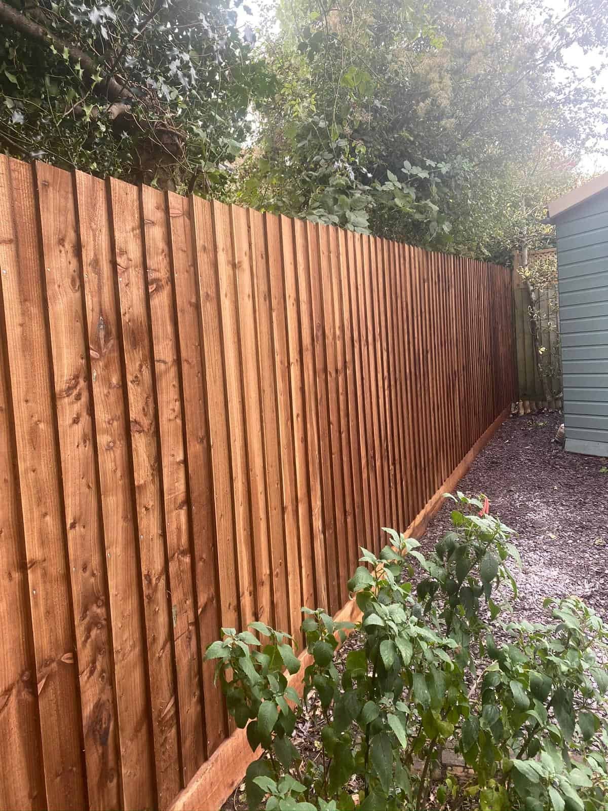 Close board feather-edge fencing installed in a Gloucestershire garden