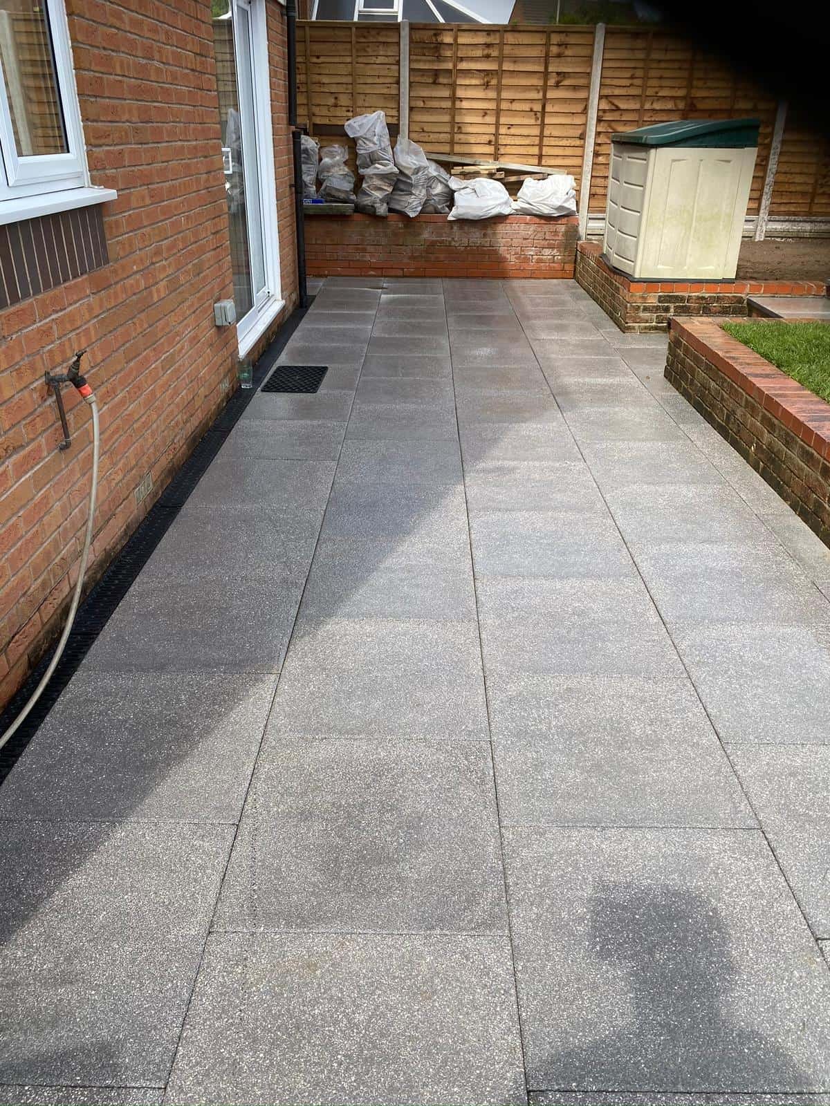 Decorative brickwork steps and garden wall in a Gloucester property