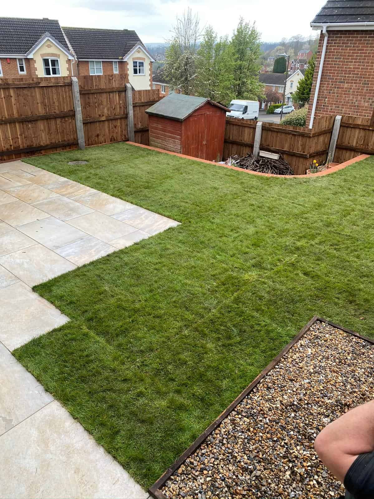Artificial grass installation with neat edging in Cheltenham