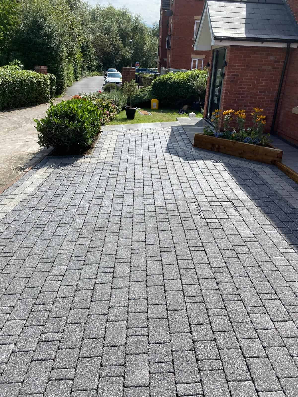 Block paving driveway installed in a Gloucestershire front garden