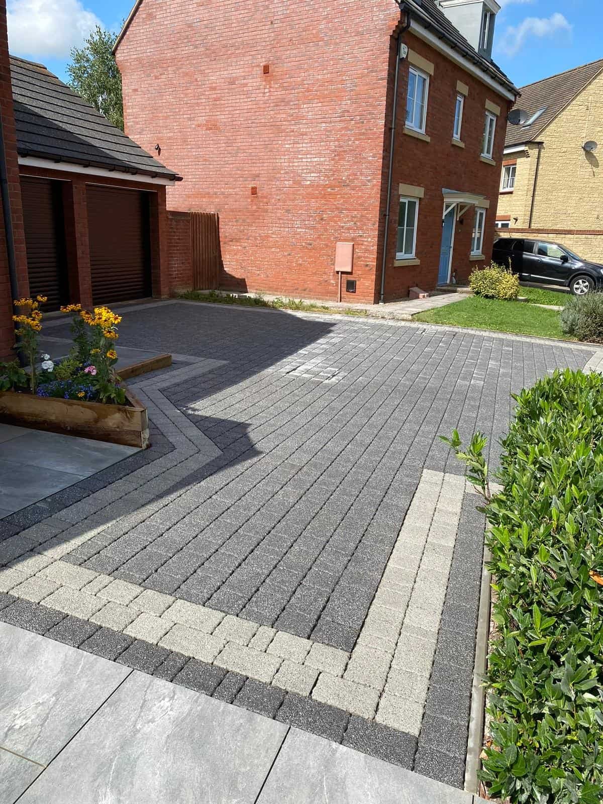 Completed block paving driveway with decorative border in Gloucestershire