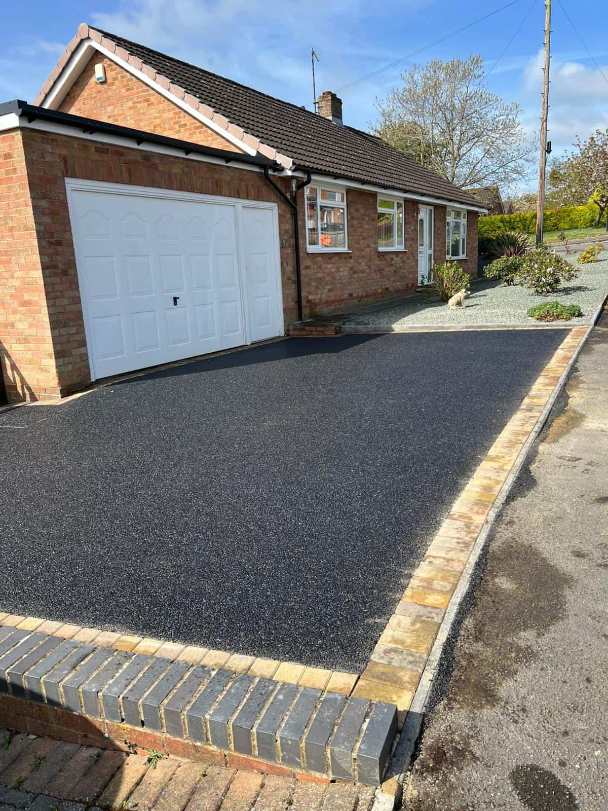 Tarmac driveway installation with clean edges in Gloucestershire