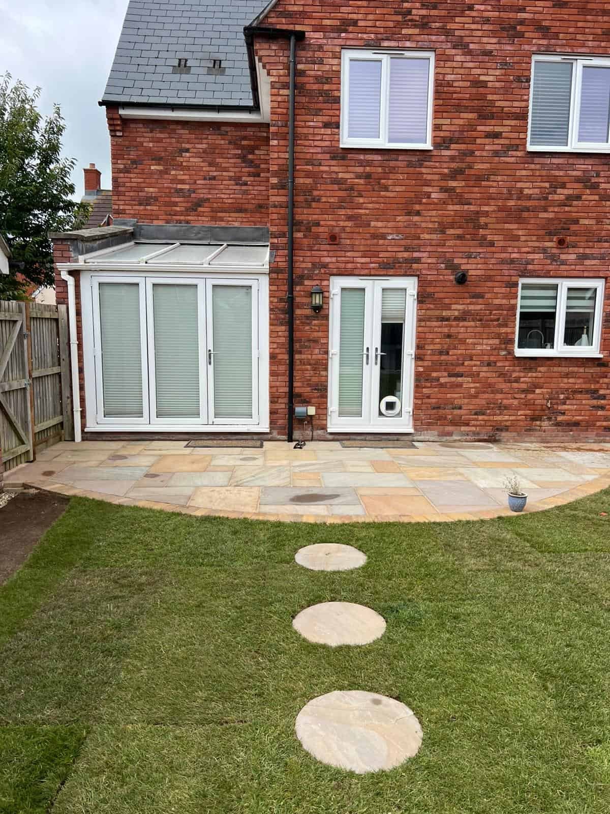 Full garden landscaping with new lawn and borders in Gloucestershire